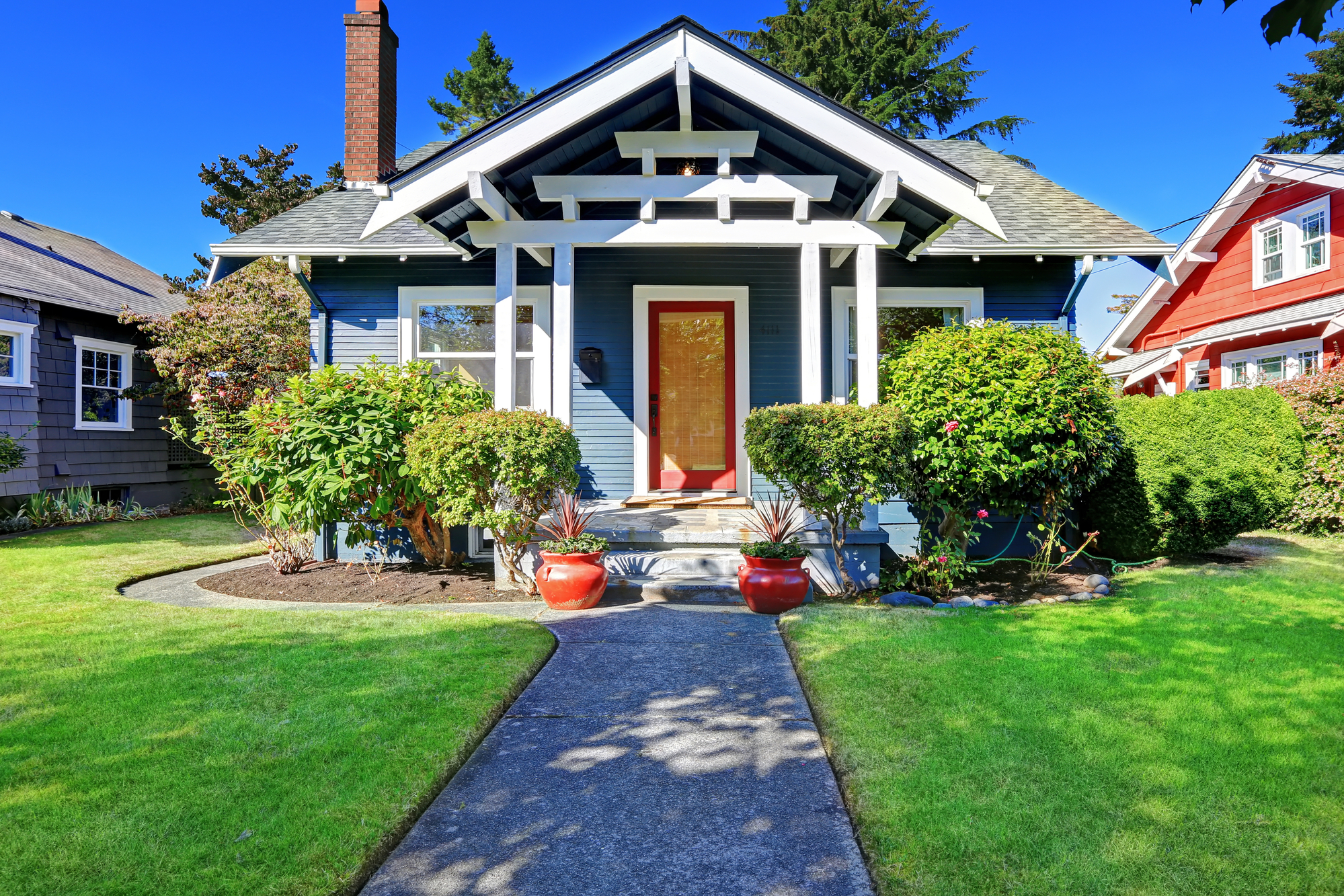 House exterior with curb appeal Simple house exterior with tile roof. Front porch with curb appeal